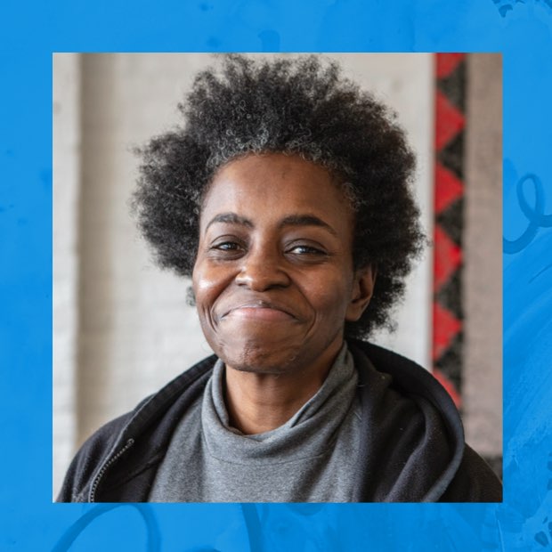 Woman smiling inside a C4 location